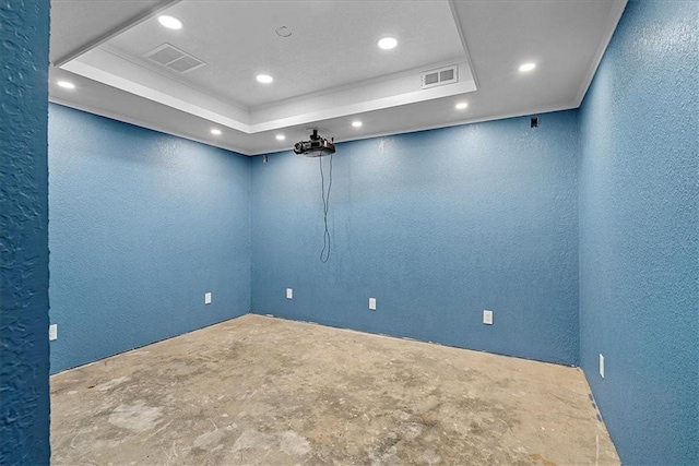 1148 N 1st Rd, Baldwin City, KS 66006 - unfurnished room with a textured wall, concrete floors, recessed lighting, and a raised ceiling