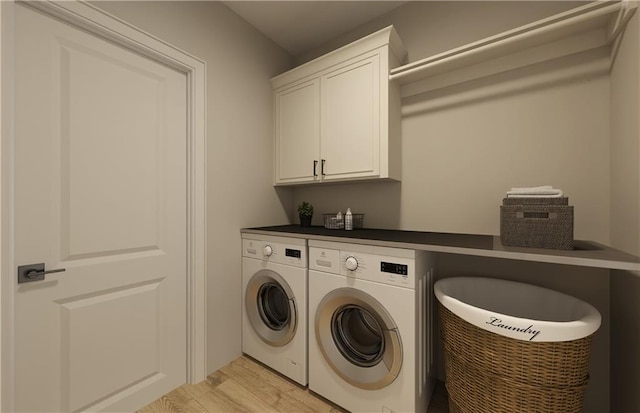 12517 S Hedge Ct, Olathe, KS 66061 - laundry room with independent washer and dryer, cabinet space, and light wood finished floors