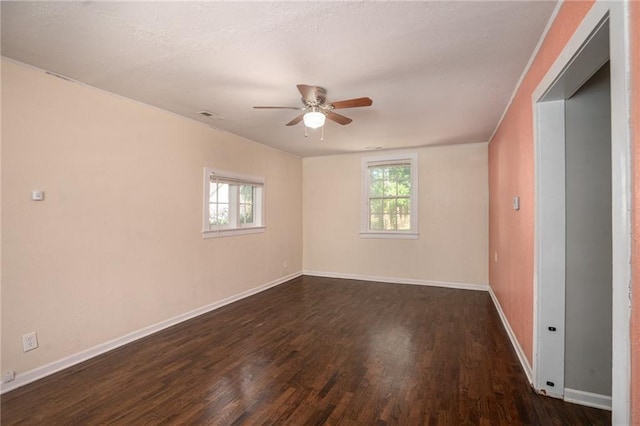 914 Jersey St, Baldwin City, KS 66006 - empty room with ceiling fan and dark wood finished floors