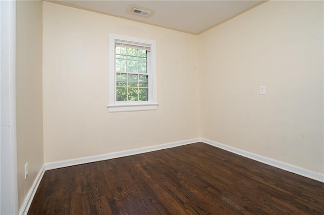 914 Jersey St, Baldwin City, KS 66006 - unfurnished room featuring dark wood-style flooring and baseboards