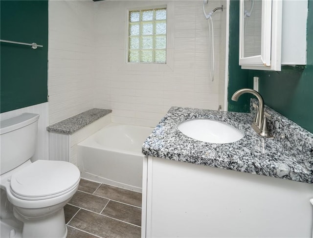 914 Jersey St, Baldwin City, KS 66006 - bathroom with vanity and tub / shower combination
