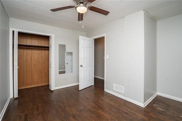 914 Jersey St, Baldwin City, KS 66006 - unfurnished bedroom featuring wood finished floors, ceiling fan, and a closet