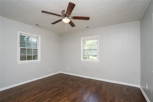 914 Jersey St, Baldwin City, KS 66006 - spare room with dark wood finished floors, plenty of natural light, and ceiling fan
