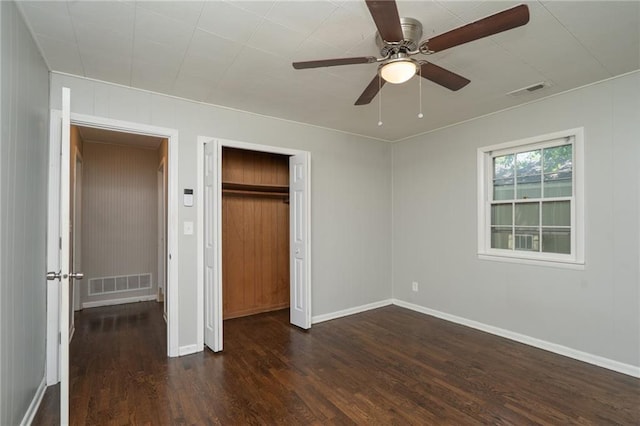 914 Jersey St, Baldwin City, KS 66006 - unfurnished bedroom featuring wood finished floors, a closet, and ceiling fan