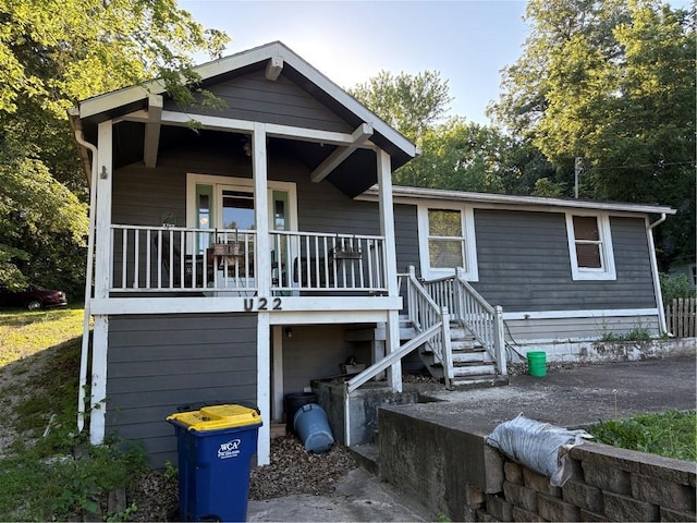 22 U Lake Shore Dr, Lake Lotawana, MO 64086 - view of front of house featuring a porch