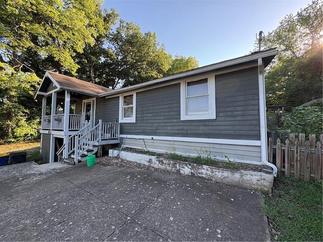 22 U Lake Shore Dr, Lake Lotawana, MO 64086 - view of front of house featuring a patio