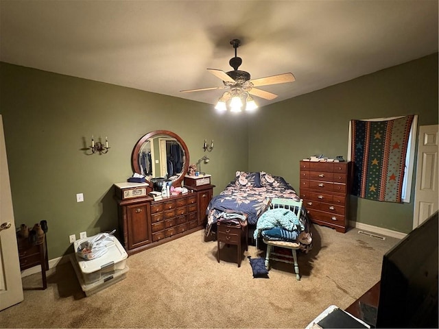 22 U Lake Shore Dr, Lake Lotawana, MO 64086 - carpeted bedroom with ceiling fan and baseboards