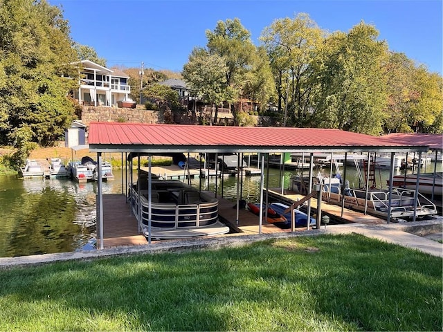 22 U Lake Shore Dr, Lake Lotawana, MO 64086 - dock area with boat lift, a water view, and a lawn
