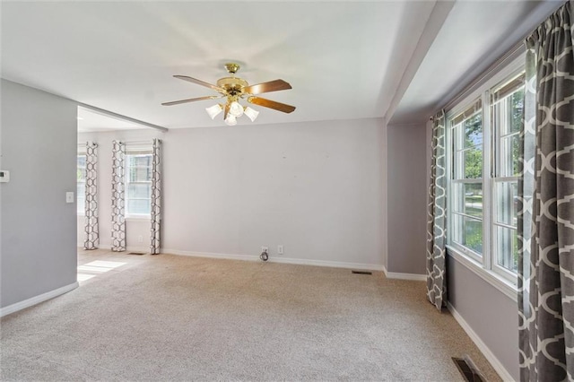 609 W Beech St, Independence, KS 67301 - spare room featuring a ceiling fan and carpet floors
