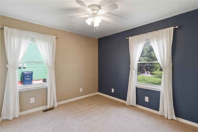 609 W Beech St, Independence, KS 67301 - carpeted spare room with a ceiling fan and baseboards