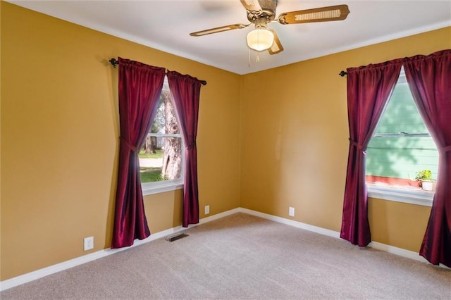 609 W Beech St, Independence, KS 67301 - spare room featuring carpet flooring and ceiling fan