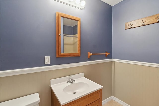 609 W Beech St, Independence, KS 67301 - bathroom featuring vanity and toilet