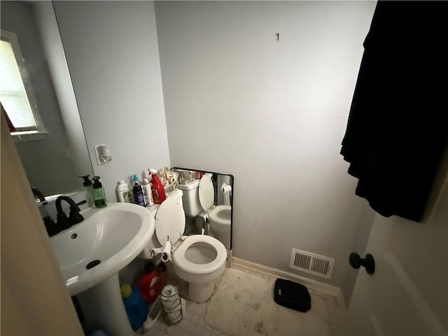 6212 Hadley St, Mission, KS 66202 - bathroom with toilet and a sink