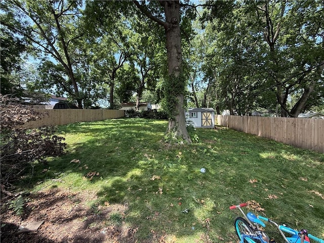 6212 Hadley St, Mission, KS 66202 - fenced backyard featuring a shed