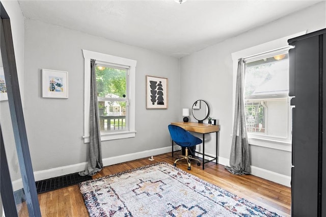 707 W 75th Ter, Kansas City, MO 64114 - office space featuring wood finished floors and baseboards