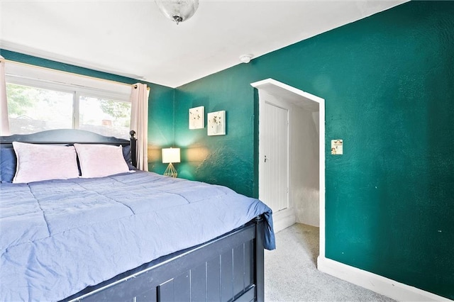 707 W 75th Ter, Kansas City, MO 64114 - bedroom with carpet floors and baseboards