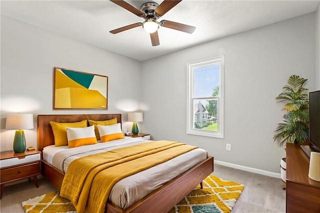 1108 W Pleasant Dr, Raymore, MO 64083 - bedroom featuring carpet floors and a ceiling fan