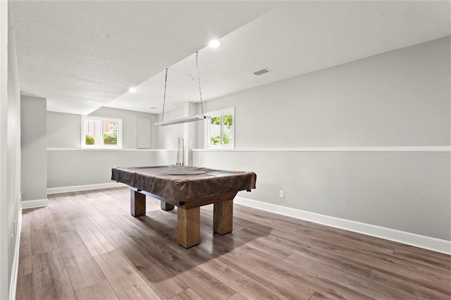 1108 W Pleasant Dr, Raymore, MO 64083 - playroom featuring wood finished floors, healthy amount of natural light, billiards table, and recessed lighting