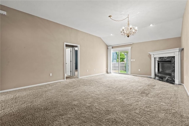 1002 W Howard Pl, Louisburg, KS 66053 - unfurnished living room featuring lofted ceiling, carpet floors, a chandelier, and a fireplace