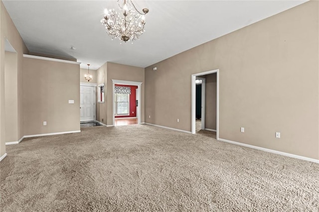 1002 W Howard Pl, Louisburg, KS 66053 - unfurnished living room featuring a chandelier and carpet flooring