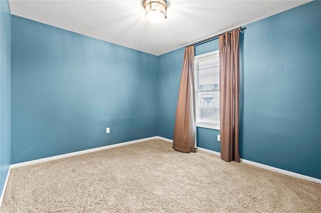 1002 W Howard Pl, Louisburg, KS 66053 - carpeted empty room featuring a textured ceiling
