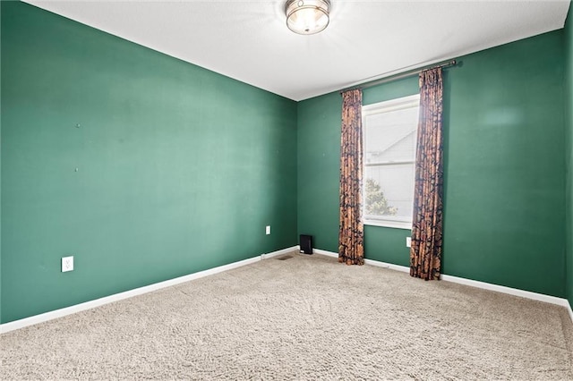 1002 W Howard Pl, Louisburg, KS 66053 - carpeted empty room with baseboards