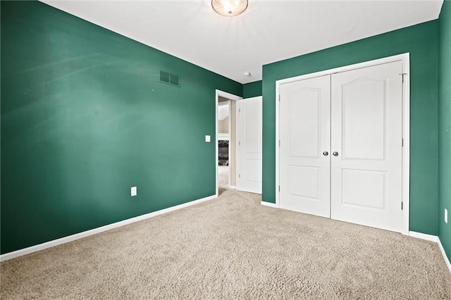 1002 W Howard Pl, Louisburg, KS 66053 - unfurnished bedroom with carpet and a closet