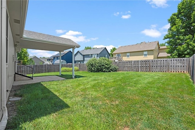 1002 W Howard Pl, Louisburg, KS 66053 - fenced backyard with a residential view and a patio area