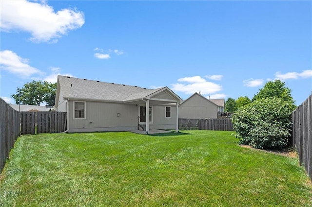1002 W Howard Pl, Louisburg, KS 66053 - back of house featuring a patio area and a fenced backyard