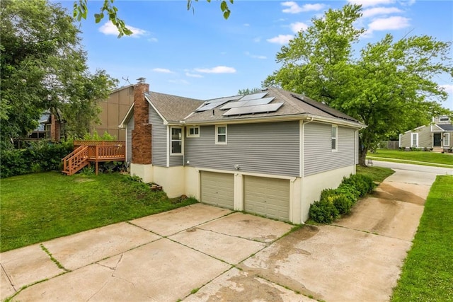 6613 E 123rd Ter, Grandview, MO 64030 - view of side of property featuring a chimney, a yard, stairs, roof mounted solar panels, and a deck