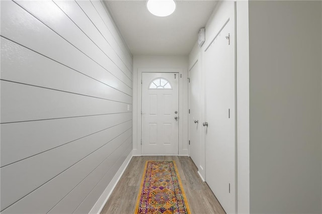 6613 E 123rd Ter, Grandview, MO 64030 - doorway with light wood-type flooring