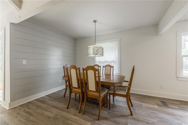 6613 E 123rd Ter, Grandview, MO 64030 - dining area with dark wood-type flooring and baseboards