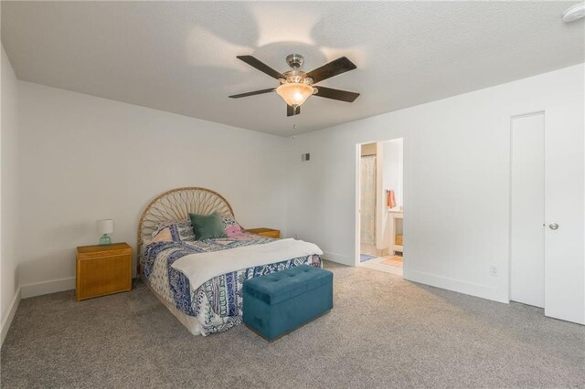 6613 E 123rd Ter, Grandview, MO 64030 - bedroom featuring carpet flooring, a ceiling fan, and connected bathroom