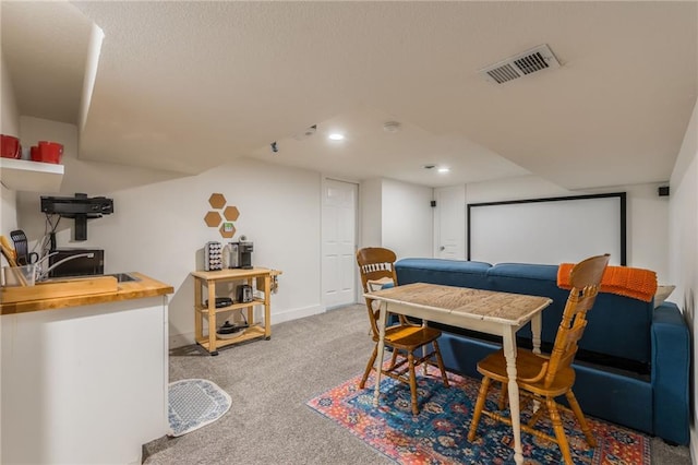 6613 E 123rd Ter, Grandview, MO 64030 - carpeted cinema room featuring recessed lighting