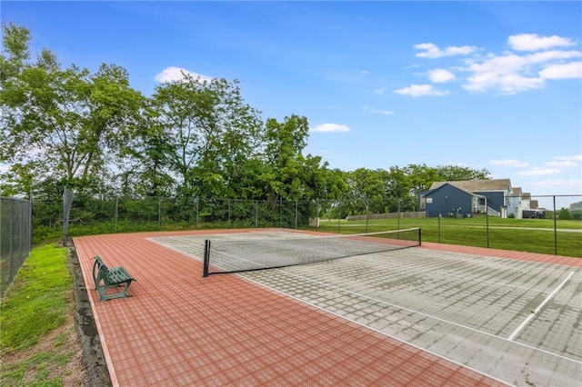 6613 E 123rd Ter, Grandview, MO 64030 - view of tennis court with view of wooded area