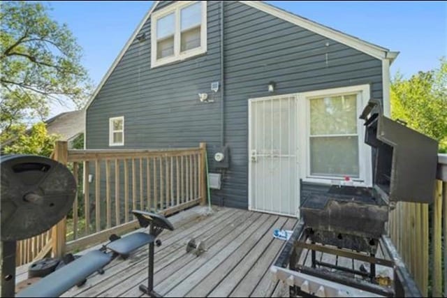 3133 Chelsea Ave, Kansas City, MO 64128 - back of property featuring a deck