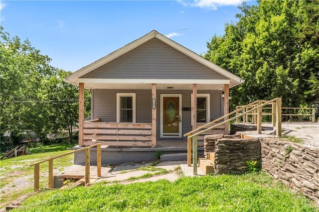 1205 E Parker Ave, Independence, MO 64050 - bungalow-style house featuring a porch