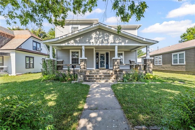 420 S Walnut St, Ottawa, KS 66067 - view of front of house with a front lawn and a porch