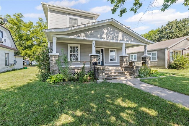 420 S Walnut St, Ottawa, KS 66067 - view of front facade featuring a porch and a front lawn