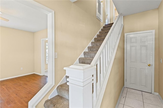 420 S Walnut St, Ottawa, KS 66067 - stairway with baseboards and tile patterned flooring