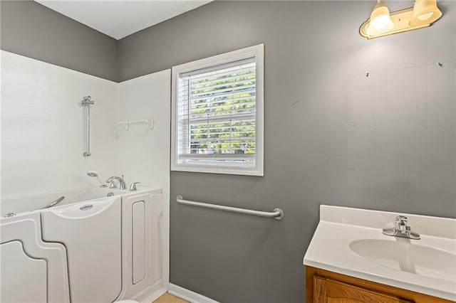 420 S Walnut St, Ottawa, KS 66067 - full bath with a tub and vanity