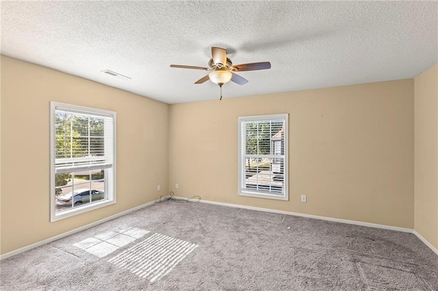 420 S Walnut St, Ottawa, KS 66067 - carpeted empty room with ceiling fan and a textured ceiling