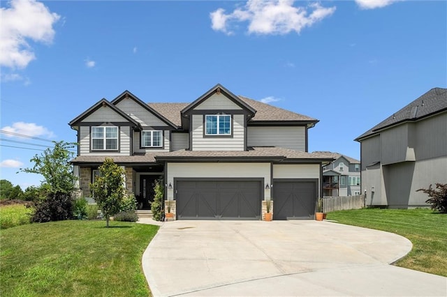 24328 W 58th Ter, Shawnee, KS 66226 - view of front of property with concrete driveway and a garage