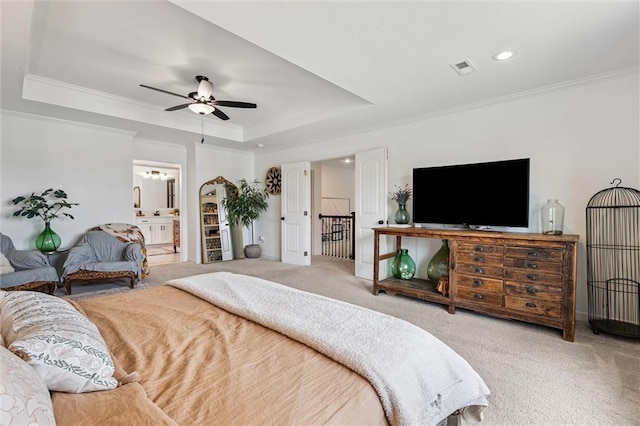 24328 W 58th Ter, Shawnee, KS 66226 - carpeted bedroom featuring a raised ceiling, crown molding, recessed lighting, ensuite bathroom, and ceiling fan