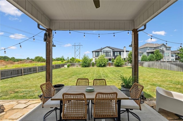 24328 W 58th Ter, Shawnee, KS 66226 - fenced backyard featuring a patio, outdoor dining space, and a residential view