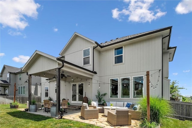 24328 W 58th Ter, Shawnee, KS 66226 - rear view of property with french doors, an outdoor living space, a ceiling fan, a fenced backyard, and a patio