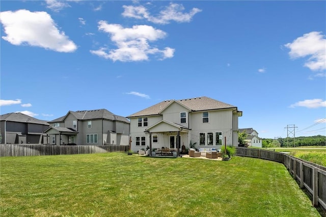 24328 W 58th Ter, Shawnee, KS 66226 - back of property featuring outdoor lounge area, a fenced backyard, and a patio