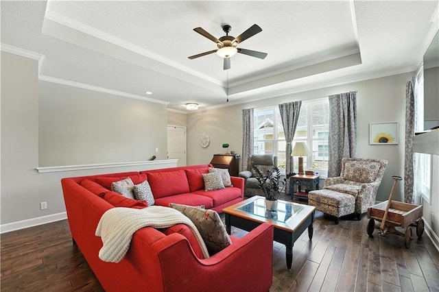 704 E 110th Ter, Kansas City, MO 64131 - living area with a raised ceiling, plenty of natural light, ceiling fan, hardwood / wood-style flooring, and ornamental molding