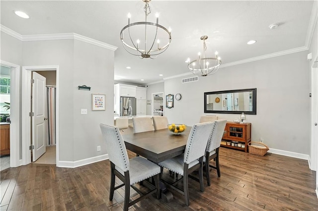 704 E 110th Ter, Kansas City, MO 64131 - dining space featuring a chandelier, dark wood-style floors, recessed lighting, and crown molding