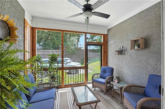 704 E 110th Ter, Kansas City, MO 64131 - sunroom / solarium featuring ceiling fan and outdoor lounge area